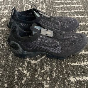 Mint Nike Vapor Max shoes.